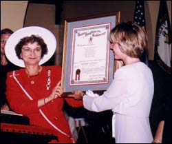 Mrs. Gum presents the charter