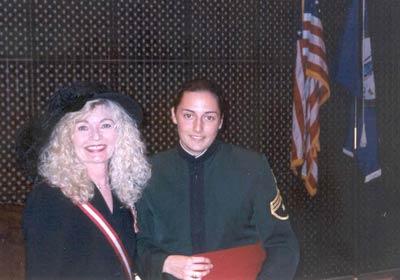 Mrs. Lougheed and Cadet Peterson